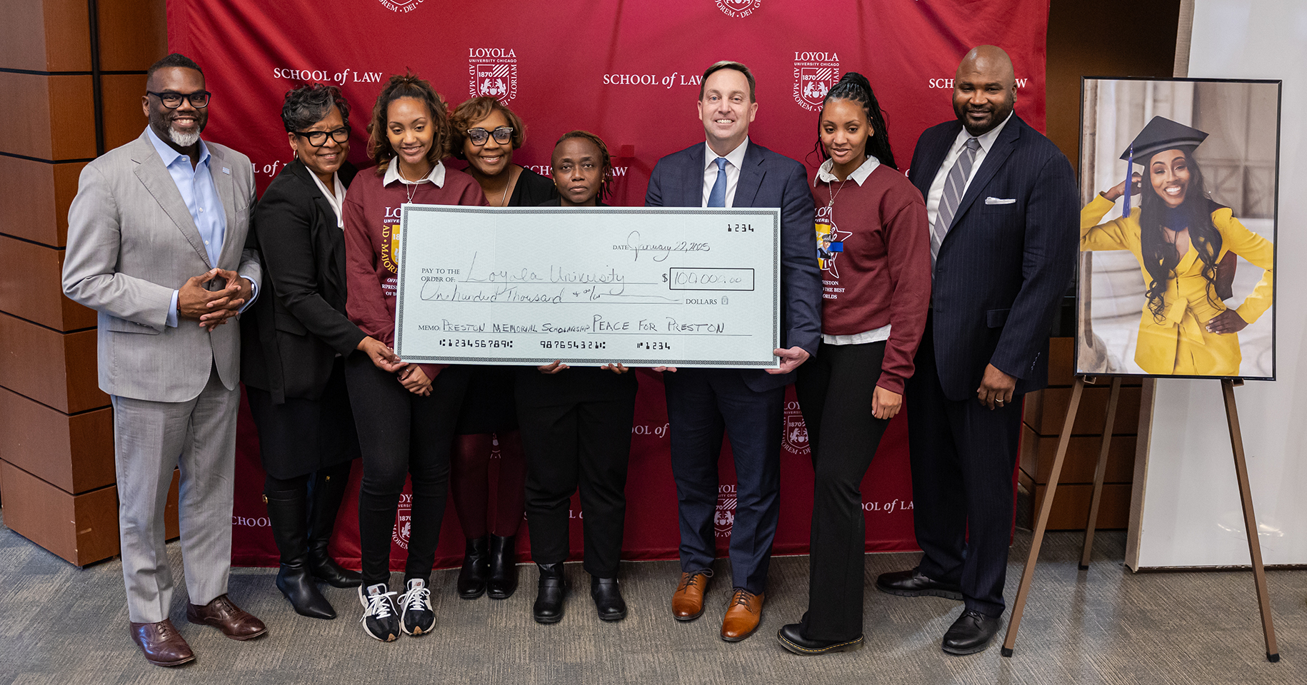 A $100,000 check is presented during the Areanah Preston Memorial on January 22, 2025. (Photo: Lukas Keapproth)