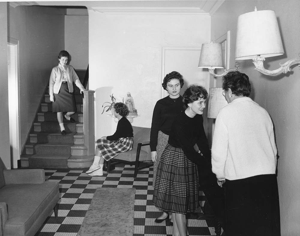 CoEds gather in the community room of Delaware Hall on the Water Tower Campus