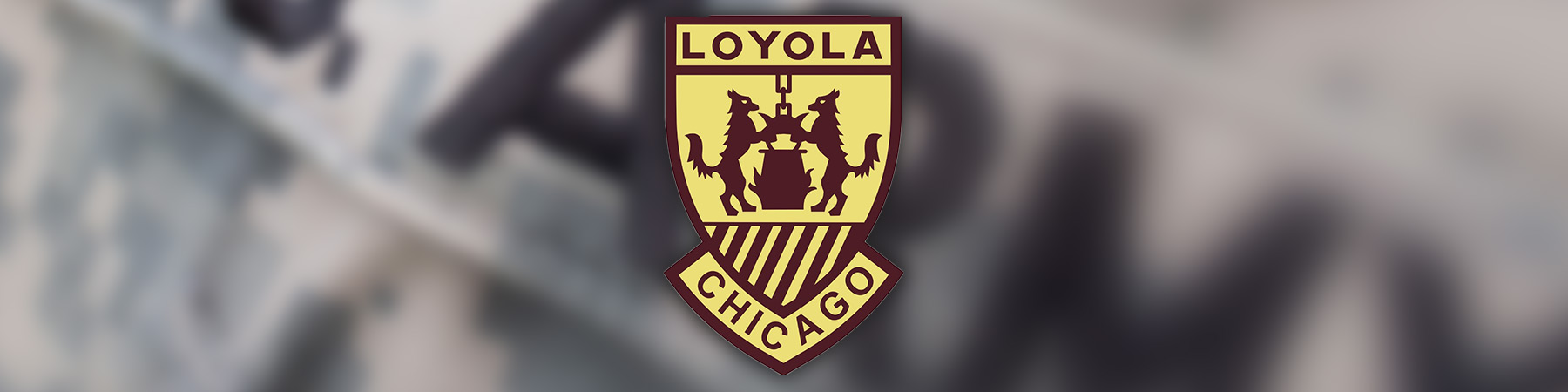  Loyola University Chicago ROTC crest on a blurred image of a US Army uniform