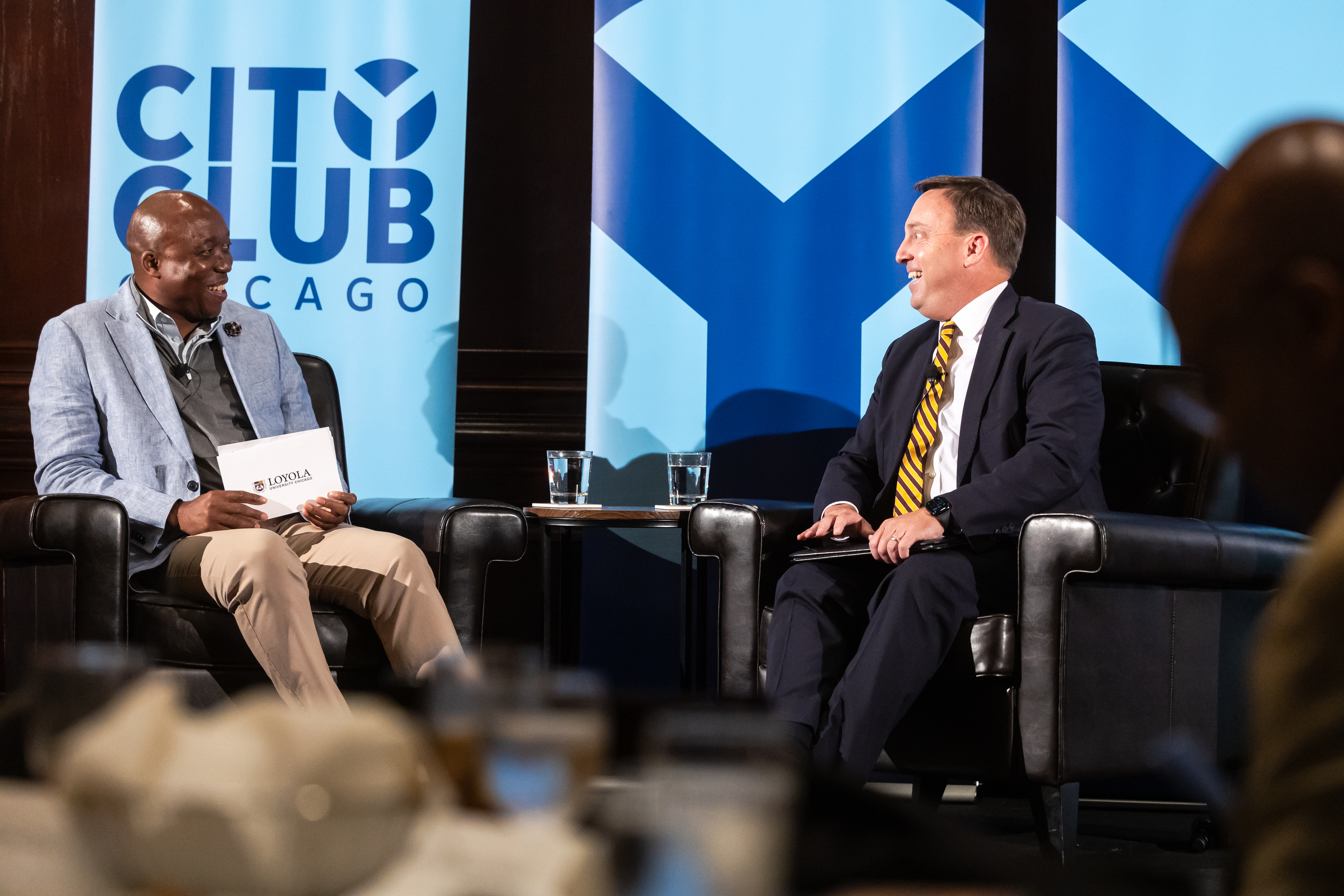 President Reed seated with Omar Brown at City Club