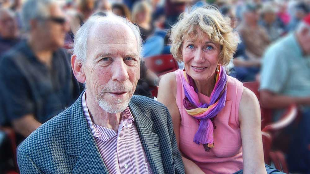 Image of George Kaufman and Mimi Winters at an outdoor concert