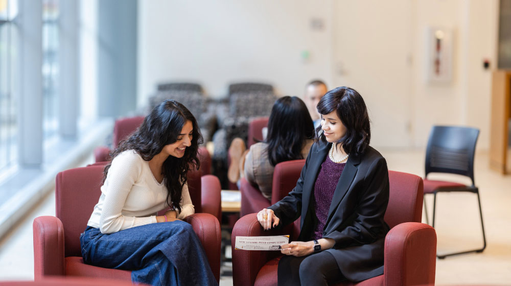 A student and a career service advisor sitting in the Schreiber Center