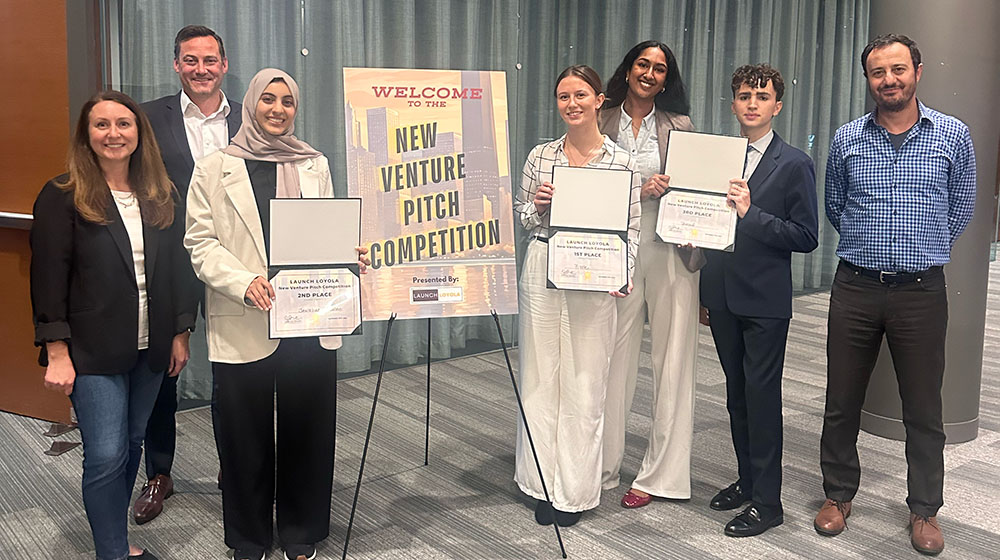 The student winners and judges of the 2024 New Venture Pitch Competition