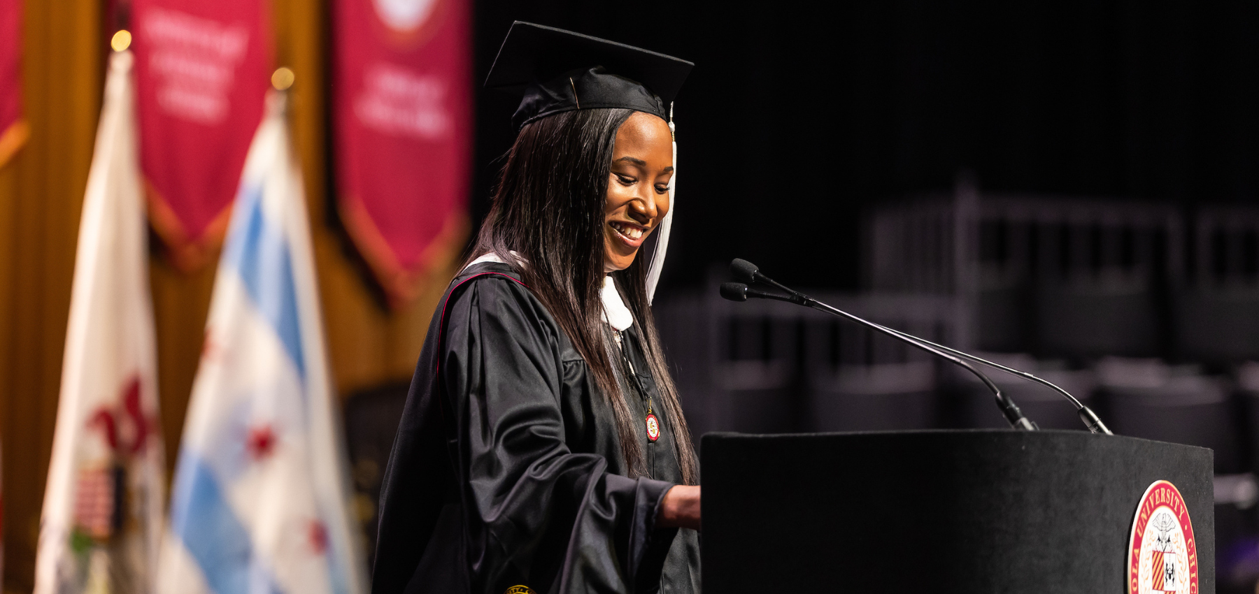 Loyola School of Continuing and Professional Studies graduate and commencement speaker, Krystal Westmoreland, presenting at graduation