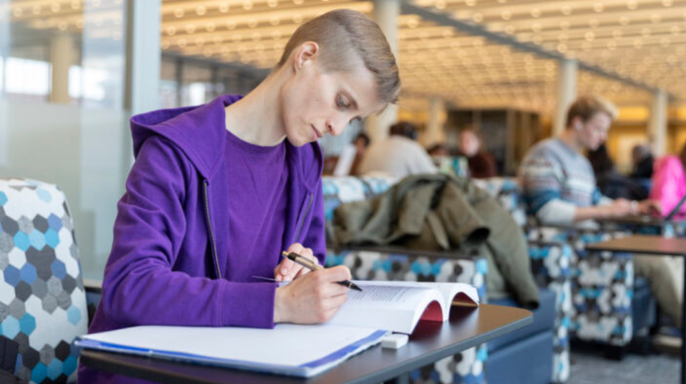 SCPS adult learner studying at Loyola's Information Commons