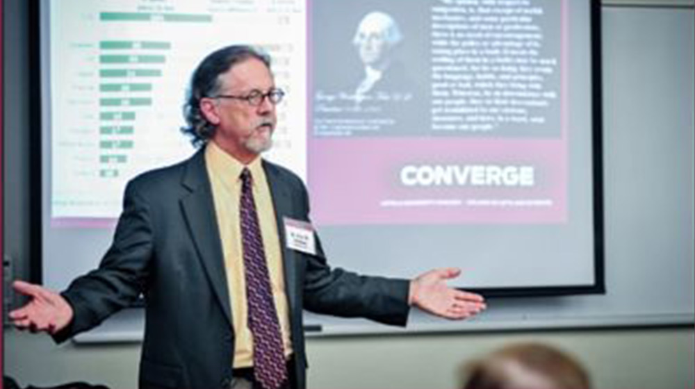 Professor Rhys Williams giving a teaching lecture in front of a class