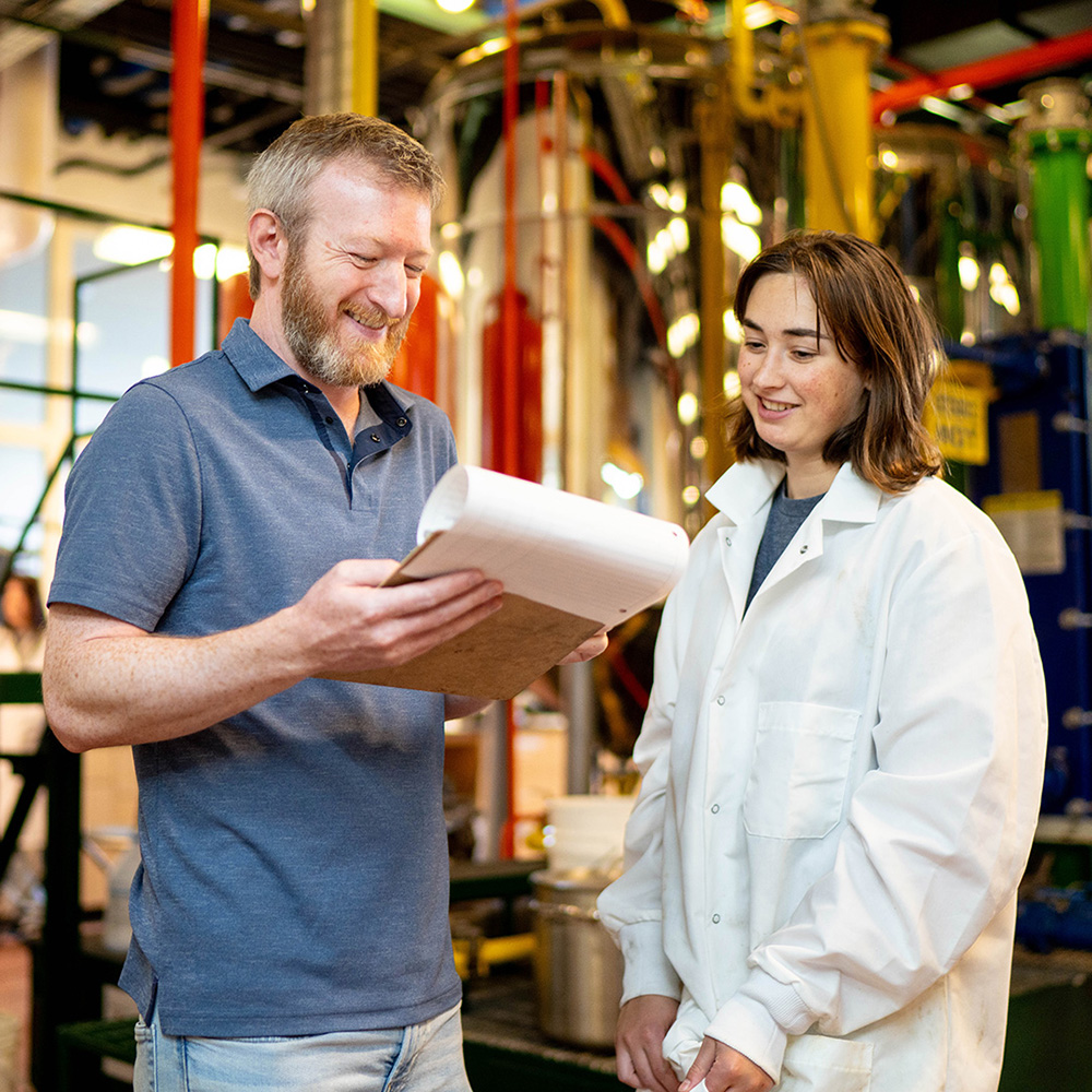 Student and staff member in biodiesel lab