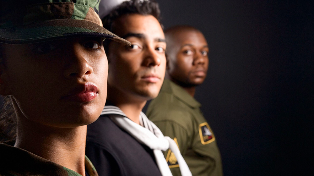 A group of three military veterans from different branches of the military.